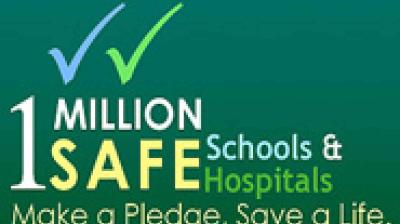 Logo with two check marks and text: "1 Million Safe Schools & Hospitals. Make a Pledge. Save a Life." on a green background.