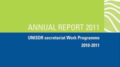 Cover page of the "Annual Report 2011" for the UNISDR Secretariat Work Programme, 2010-2011, with green and blue color blocks and a white pattern.