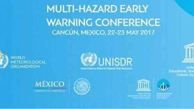 Banner for the Multi-Hazard Early Warning Conference, held in Cancún, Mexico, on May 22-23, 2017, featuring logos of organizing and partner organizations on a blue background.