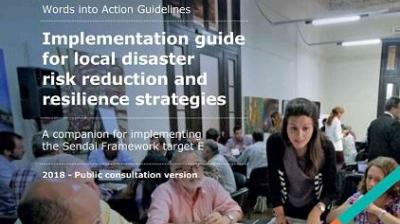 People at a workshop discussing the "Implementation guide for local disaster risk reduction and resilience strategies." Text on image includes "2018 - Public consultation version.